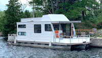 36 FOOT SUNDANCE HOUSEBOAT FOR SALE IN THE BOBCAYGEON AREA OF ONTARIO, CANADA