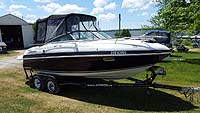 2003 Four Winns 205 Horizon Cuddy with factory trailer sold by a marine, boat and yacht broker in the Pickering, Whitby, Bowmanville, Peterborough, Belleville, Trenton and Brighton areas of  Ontario, Canada.